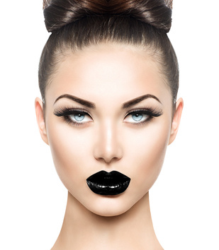High fashion beauty model girl with black make up and long lushe